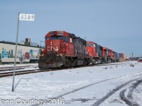 CN #120 obviously had some problems during the night and picked up GP38-2 4730 somewhere along the way to lead it into Halifax. 