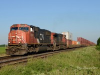 Early mornings in June are just about the only time of the year to shoot from the north side of the tracks as Train 148 heads east bound out of Sarnia at Waterworks Side Road with CN 5628 and CN 2569.