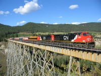 Passenger Excursion "Chairman Train",on BC Rail. This was day 3 of the 4 day trip that I was Engineer on. Initially we started at North Vancouver to Whistler, day 2 was Whistler to Prince George, day 3 Prince George to Exeter, day 4 Exeter to North Vancouver. A lot of rail miles and throttle hours in 4 days. We stopped at Deep Creek bridge, mile 330 on the Prince George subdivision for a few images. Deep Creek bridge is approximately 1200 feet long and 322 feet high, construction completed in 1920 built by Canadian Bridge Co of Walkerville Ontario. Oddly enough Deep Creek bridge spans Hawks Creek.
On the initial northbound portion of this excursion, there were numerous guests and dignitaries on board, including CN Chairman of the Board, several members of the CN Board of Directors, a former US ambassador to Canada, couple other high profile persons and their spouses. The only person missing was EHH.