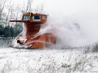 A CN snowplow run on the Fergus Sub keeps the line clear of winter snow, shown here operating south of Guelph (between Guelph and Hespeler) on February 23rd, 1986.
<br><br>
<i>Geotagged location not exact.</a>