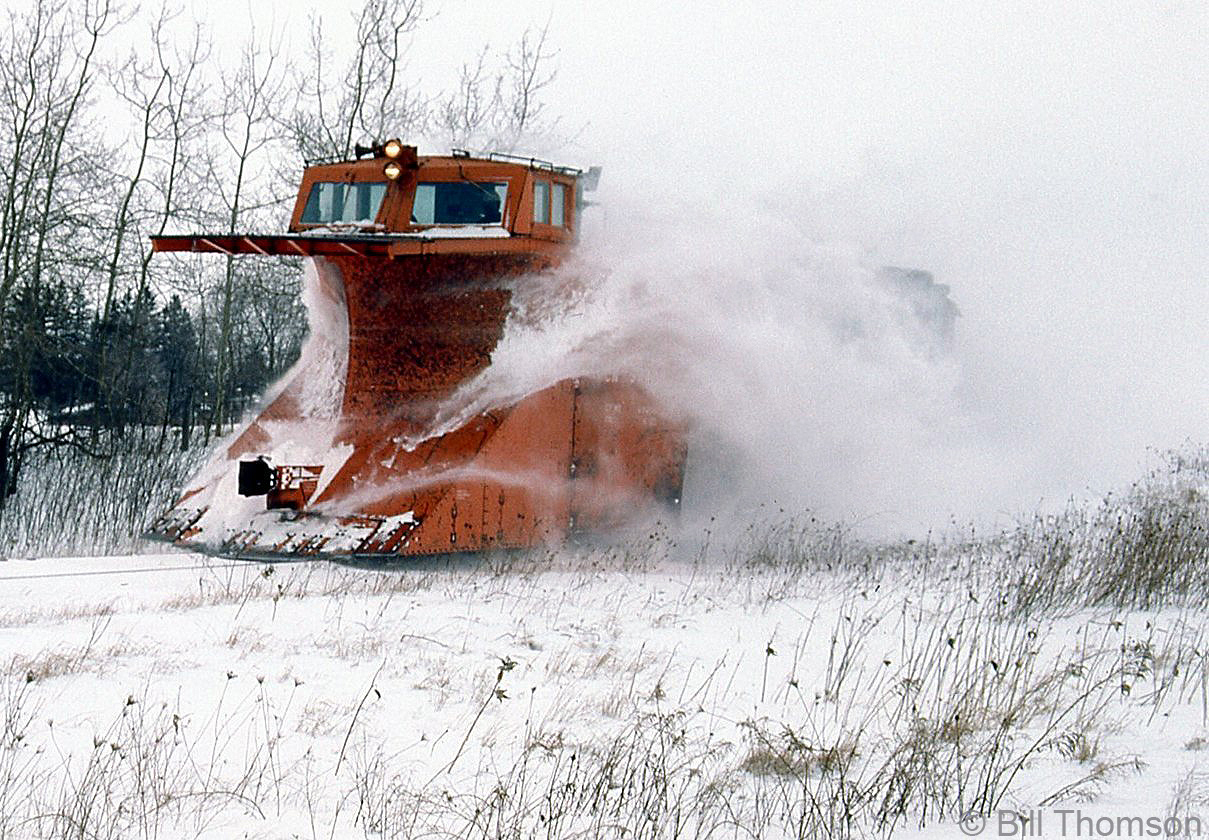 A CN snowplow run on the Fergus Sub keeps the line clear of winter snow, shown here operating south of Guelph (between Guelph and Hespeler) on February 23rd, 1986.

Geotagged location not exact.