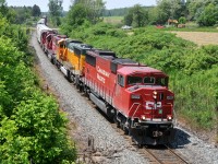 234 has just crossed Highway #2 on the west side of Woodstock, ON with CP 6259, BNSF 9980, CP 6249, and CP 2257 leading the way with 100 cars. It was a nice change to see a solid EMD consist on CP for a change!