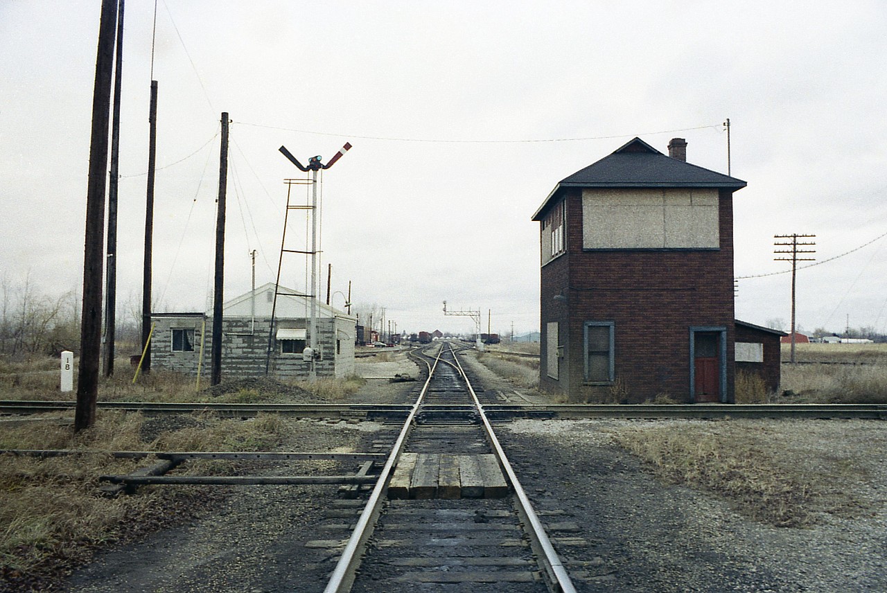 Looking eastward down the CP line at the old CPR/C&O Interlocking Tower. One can see the CP Chatham Yard in the distance. The tower and the C&O line are long ago history........