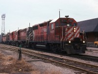 On a snowless day in February 1981, I caught this eastbound ( ? train 904 perhaps) with GP35 5021 leading a pair of RS18's and F7 4036. The CPR brick station is still standing in this image,  but it would soon be relocated to Fred's Nursery on McNaughton Ave East ( by 1983, brick by brick). I see a recent story that the new owners of that nursery were trying to resell the station (sad). 