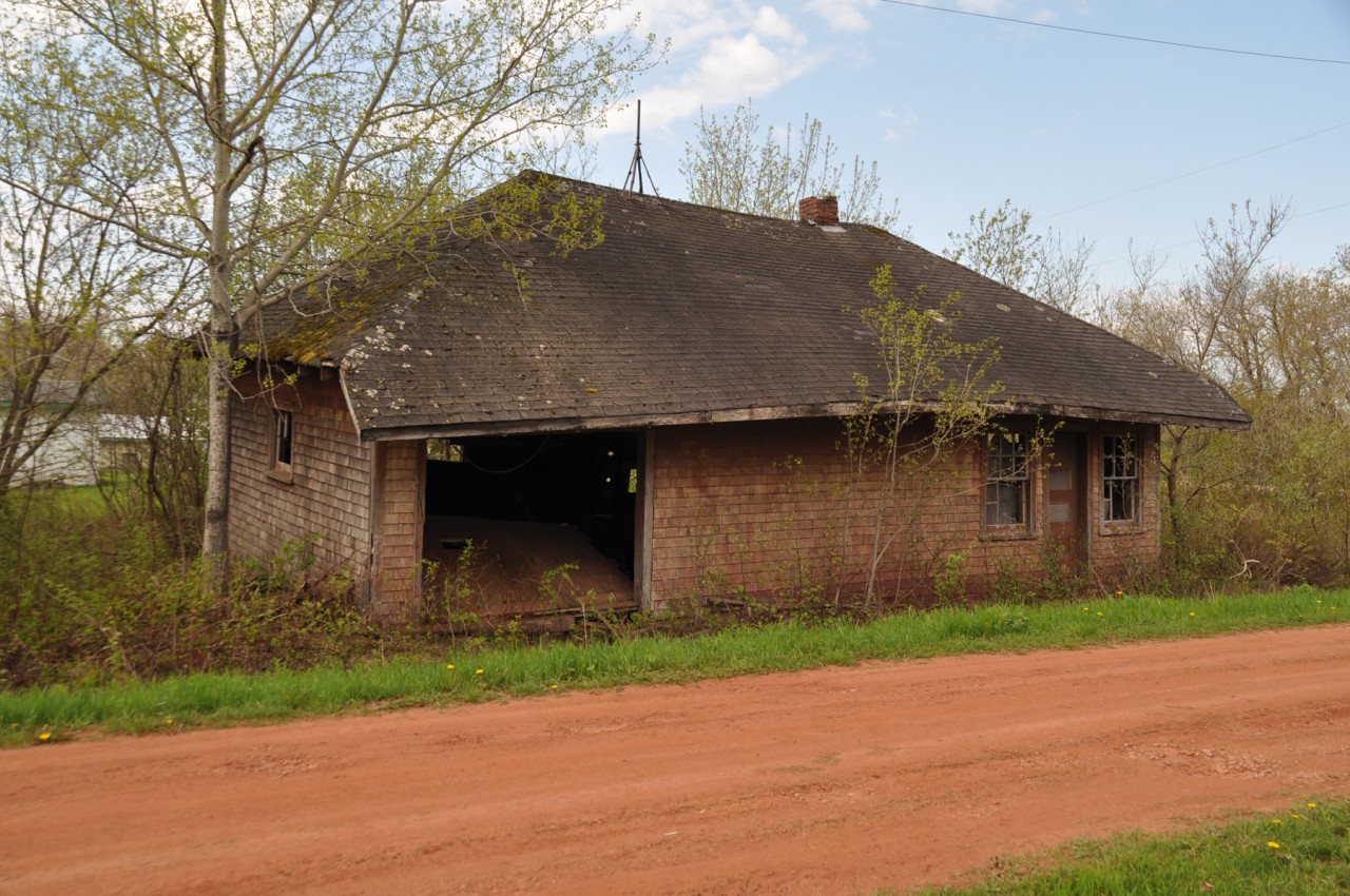 It is not easy sometimes, looking for old stations. I realize they have limited appeal on this group for the most part; but this one deserves to be seen. For it is a survivor. Here we are in 2017 and the poor old relic  still exists. Still on it's feet. But barely. There has not been a train thru here in at least 27 years and probably the last passenger was 20 years before that. So somehow it has managed to evade vandals and all the rest of it. Pity though, it has no future. The foreground is now the Confederation Trail, a fitting modern day replacement of almost all 278 km of main line track there once was on this island. Hopefully there are some PEI lurkers on this site that will enjoy this image.:o)