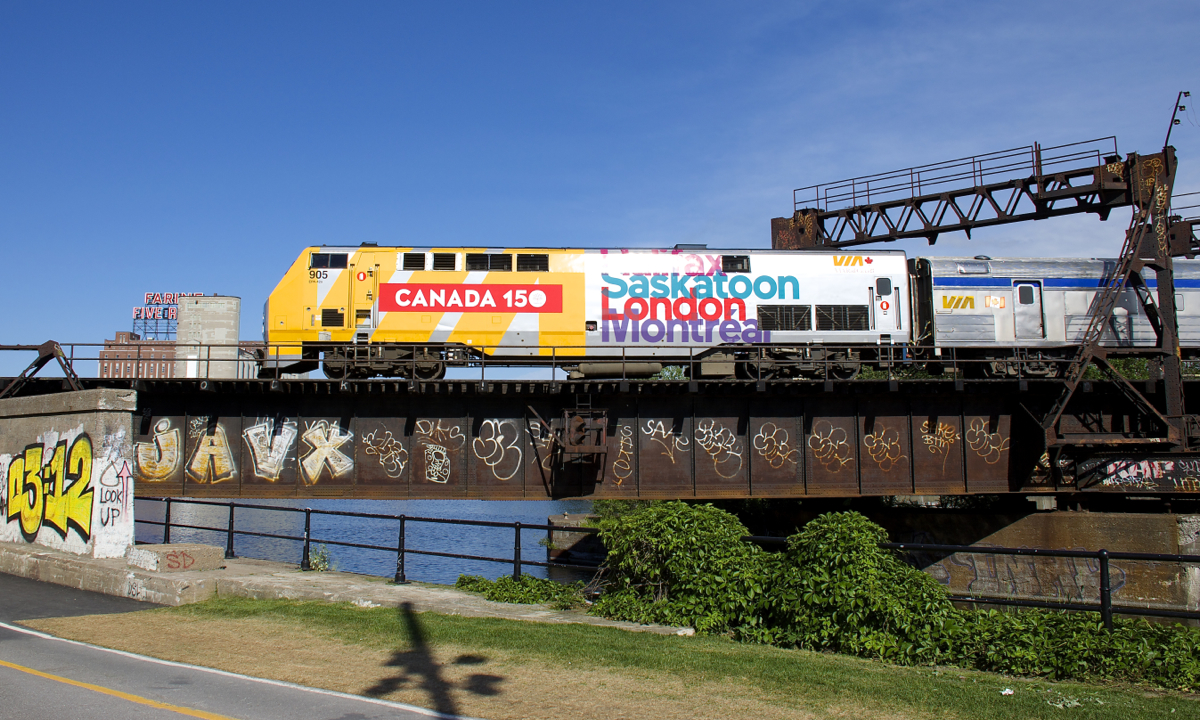 VIA 905 leads VIA 64 over the Lachine Canal as it approaches Wellington Tower. The train is running just a bit late, as always seems to be the case with this train.