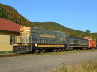 CLARENVILLE COLLECTION. NF110 # 900 lives on as a static display at the Clarenville Heritage Society on the beautiful early autumn morning of October 10, 2013. Built by GMD in 1952 and with a CN Class of GR-12-a, it and her 1200 HP sisters 901 and 902 were the first of the type to arrive in Newfoundland to start replacing the Mikado and Pacific steam engines still operating on the Island's narrow gauge railway. Beautifully restored to her glorious green and gold paint scheme by the Society, this engine also accompanies Diner 176, the last diner ever built in Canada for the CNR in 1958 as well as Terra Transport Caboose 6061. 