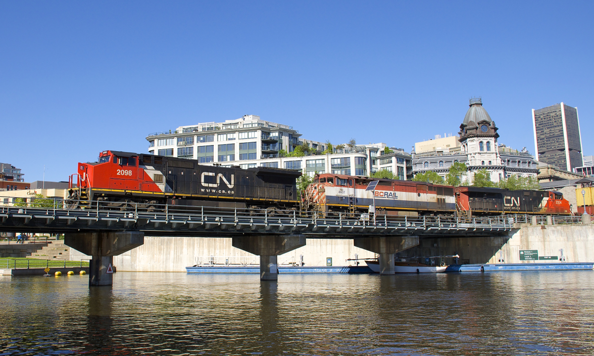 CN 149 has CN 2098, BCOL 4607 & CN 2324 for power as it crosses the Lachine Canal in Old Montreal, at the start of its run to Chicago.