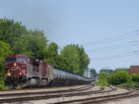 CP 650 has AC4400CW's CP 8614 & CP 9646 for power (both in the 'beaver' paint scheme) with 96 ethanol loads and SOO Line buffer cars at each end as it passes the perenially empty Lasalle Yard.