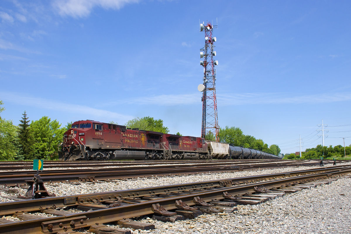 CP 650 has AC4400CW's CP 8614 & CP 9646 for power with 96 ethanol loads and SOO Line buffer cars at each end as it passes the Lasalle Yard.
