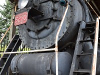 Despite the amount of pigeon poop, over grown and untended gardens, and the lack of paint, former CNR 5270 has a weather shed and formidable fence, to protect it.  Some vandalism has occurred, but with the cab welded shut and windows sealed, not to mention a roof over it, the Pacific has potential for eventual restoration.