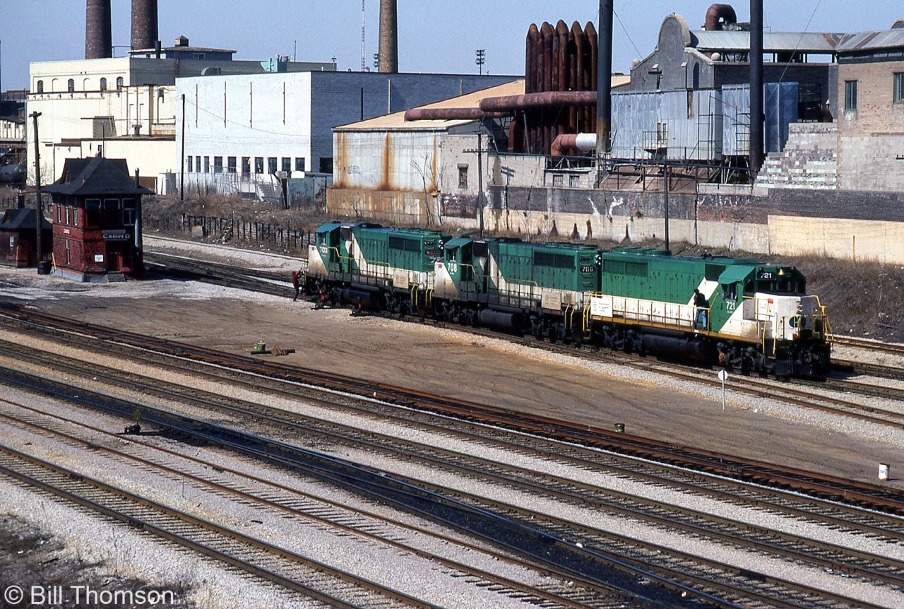 GO Transit 721, 708 and 703 (a GP40-2 and pair of GP40-2W units) pause near Cabin D interlocking tower in the Toronto Terminals Railway territory at Bathurst Street. CP had been using them on freights over the weekend, and now they're being returned back to GO for their regular weekday commuter duties.