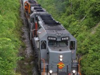 The Goodrich Exeter's newest arrival SD40-3 #6908 has added a little more variety to a roster that is gradually fading away to GW orange. although the unit was built decades ago for Canadian National it has since been rebuilt with an upgraded electrical system by Alstom and is probably one of the most up to date units on GEXR's roster. This overhead view shows off some of the units details specifically ordered by CN, from its snow shields, to two colour class lights, since plated over above the number boards. The notch cut out above the former bell location was to eliminate clearance issues with the horn, since relocated as well. Today's trio of SD's are digging hard into the beginning of their climb up the escarpment as they head west for Stratford.