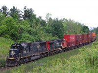 I've always liked this spot on the curve east of mile 30. Typically it is only a late day shot, but on overcast days it really doesn't matter. The spring and early summer months are best as well before the cat tails obstruct the units trucks. As luck would have it IC Sd70 #1007 makes a rare appearance in the lead in train #148 as it rounds the bend. It's always nice getting something not in CN paint in the lead these days. 