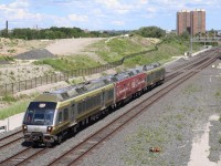 While the Union Pearson Express doesn't typically excite me too much, I found myself in the right place at the right time, and with Canada's 150 birthday quickly approaching I had to make an effort to snag at least one of the wrapped UP units. My sons both love the UP so after a birthday party we we off to the Islington Ave overpass for a couple of quick shots. here we have UP 1001 leading a three unit consist along with a wrapped unit. 