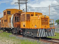 On display at the Portage la Prairie CP Station is ex Manitoba Hydro GE 25T # 857, with CP caboose 434560