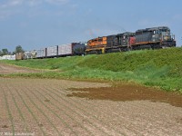 GEXR 431 races across the flatlands east of New Hamburg at a brisk 10mph or so. Wide open embankment with sun is nice, slow order where I was trying to decide between two places to shoot, jackpot... got both.  QGRY 6908, GEXR 3054, GEXR 3394. 1654hrs.