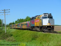 Almost...... a nearly completely matching VIA 84 is eastbound at Mosborough Ontario in the smart Canadian 150th scheme on a perfect, not too hot, cloudless day. There is only one business-class car in the VIA wrap so a matching train will be difficult to come by.