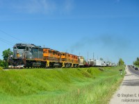 GEXR 431 with the new kid on the block, SD40-3 QGRY 6908 is westbound leaving Acton in notch 'give er' to keep a few thousand tonnes on the drawbar moving up the Acton grade. I recorded audio again, and you can listen to the cars flying by and the train <a href=http://steve.hostovsky.com/431-june3-edited.mp3 target=_blank>by clicking here - warning: LOUD. </a><br><br>And we've come full circle. I have shot ex GCFX (Alstom rebuild) SD40-3's on GEXR before - on both GEXR and CN trains, as did many others, but they were quite rare on GEXR. And I'm not one to keep records, but these I did keep thanks to some friends. <br><br>Due to derailments at both Gobles and at Bayview on the Dundas sub, a number of trains re-routed over GEXR (Total about 40). February 13/14/15 (17 CN 2 NS 8 VIA)  and  Feb 19/20 2003 (8 CN 4 VIA) and yes, the regular GEXR and VIA trains did run -- it was very busy! At the time, CN used lots of Alstom SD40-3's and I was already sick of 'em. By date:<br><br>February 15 2003: CN 383 had GCFX 6071 trailing as third unit<br>February 19 2003:  CN train 271 @ Kitchener met 434 and another CN Eastbound @ Kitchener in the siding with GCFX 6043, BNSF 2636 (Santa Fe paint, blue), and BNSF 2537 (Orange). This unit became QGRY 6913 so.. very close…<br>February 19 2003: GCFX 6041 on CN Q14291-18 <br>February 20 2003: GCFX 6071 on CN M39031-19 <br>February 20 2003: GCFX 6057 on CN Q14891-19 <br><br><br>And GEXR once borrowed a pair of SD's, back in these days they could have come in on a Potash Extra (Unit potash trains from out west, destination Agromart @ Kellys) and once on GEXR - GEXR would use them for 432/1 for as long as CN let them... which usually wasn't very long. The unit trains stopped around 2003/4..<br><br>November 13 2003: GCFX 6048 IC 6140 (in CN paint) found on 431 in Kitchener (no other motive power) returning to the regular four axle power the next day.<br><br>So yeah, full circle, eh?