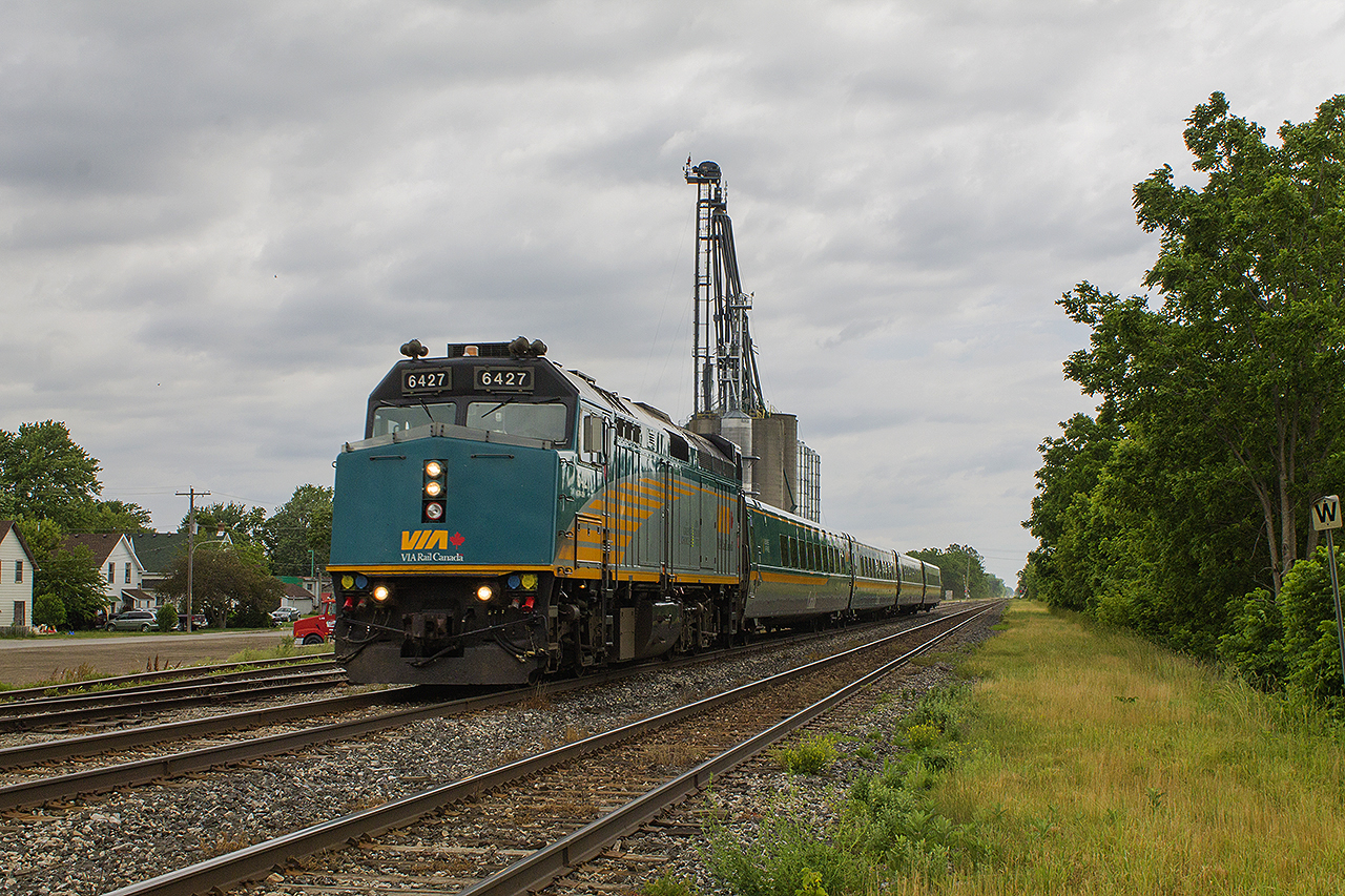 THREE TIMES LUCKY!  It was kind of nice as train 71 approached Thamesville, as it was all in it's regular colours - no Canada 150 wrapped equipment. Here 6427 takes the charge rushing it's way to their next station stop of Chatham. Although the weather didn't quite co-operate as it clouded over just before the train arrived, I had photographed 6427 twice before.


 October 31,2015 at Port Hope 

 And in July 2011 at Lynden