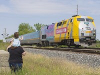 <b> A FAMILY AFFAIR - Traditions never die! </b> It's amazing being a parent - especially of those memories that come back to you when you experience the wave from an engineer of a passing train, along with a couple of short toots on the horn as it glides by. My grandfather taught me of his love of trains, and I now get to share that with my daughter. But it doesn't just end there. I dedicate this photo to the dad's that work the long hours, as the engineer's of the road. And as mentioned already, to the grandafther's who have passed on their love of the railroad to their children, and continued the tradition with their grandchildren. And to the men who work for the railroad today, providing for your own families and creating new memories for kids of all ages. This photo is for you Dads - as I thank you all for taking the time to acknowledge us fans as you pass by. Happy Father's Day too! You have helped make new memories for me and my daughter. 

Side note: I had photographed 904 before outside of Paris just over a year ago. It was also a special moment then as it was <a href="http://www.railpictures.ca/?attachment_id=24489"> Dale Pringle's last run. </a>