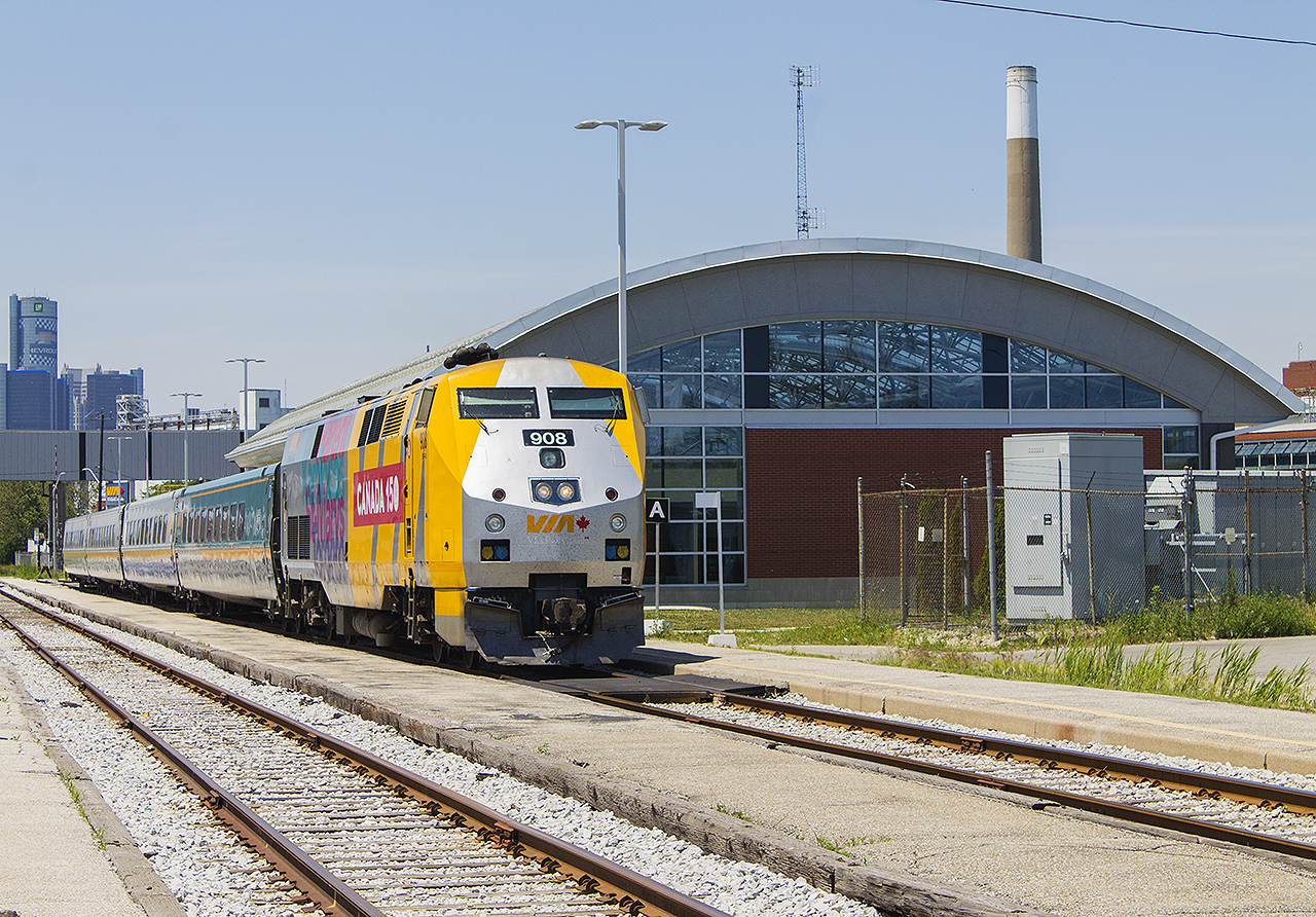 You know you're a die hard rail fan when you're standing outside in what feels like 40 degree heat and sunshine. I was waiting to capture Train 76 departing from the station at Windsor. The station seems out of place being fairly new, as it stands among buildings that were constructed in the 19th century and are now abandoned. Canada 150 wrapped VIA 908 is in the lead.