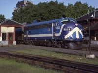 One of the morning commuter trains is making it's brief stop at the Westmount station. Montreal and Urban Counties Transportation Commission FP7 1303 is in the older paint scheme. All the MUCTC cab units were exCPR, in this case, formerly 4073. 1303 was sold to Chaudiere Appalachian tourist train operator, but scrapped in 2006.