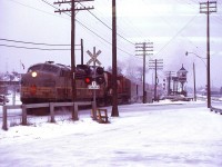 Feb 21/73 I caught train No. 11 with 4073-8574 on a dull cold afternoon leaving West Toronto. Even thought it's a cluttered image, it still provides an overview of what The Junction looked like at that time. CN's Weston Sub is on the far right, with the CP North Toronto Sub crossing east/west in the far background. And even further away is the still-standing CPR West Toronto " heritage " station. Either I took this through an open window from inside the CN waiting room, or, I walked outside and stood beneath the roof overhang. Just another day at CN West Toronto - tickets, telegrams, trains and what-have-you. (for a later-life photo of 4073, see my photo of MUCTC 1303) at <a href=http://www.railpictures.ca/?attachment_id=29750 target=_blank>http://www.railpictures.ca/?attachment_id=29750</a>