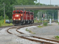 CP T40 heads light approaching McDougall Street with a trio of SD30C-ECOs where it will then reverse in to Windsor Yard
