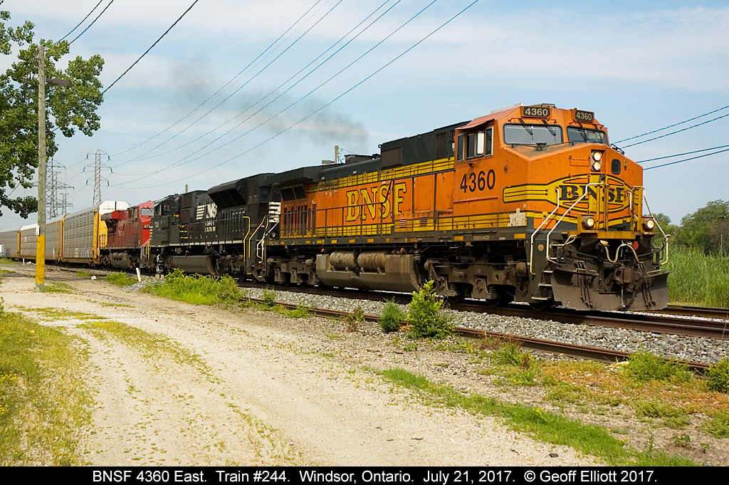 BNSF 4360, NS 7231 & CP 8713 lead train 244 away from Dougall Ave., in Windsor, Ontario on July 21, 2017. Upon arrival, only the BNSF and NS were on the train. Power went to the yard and lifted the CP GE. After departing here, they added CP 5039, CP 6236 to the point, ruining a nice lashup for everyone east of Windsor. Sorry guys....