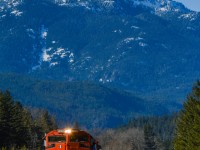 With a chilly outflow from Whistler blowing through Paradise Valley out to Howe Sound, CN's daily southbound for the for the former BCR lines south of Prince George (aka the Cariboo Division) rolls down the main at Cheakamus after spending an hour negotiating the Cheakamus Canyon. 