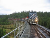 Another view on that dreary wet afternoon, a perfect day to stop the train for an image or two except for the weather. Mile 206 is in the middle of this bridge that spans Fifty One Creek.
Link to other image taken this day.
http://www.railpictures.ca/?attachment_id=30111
