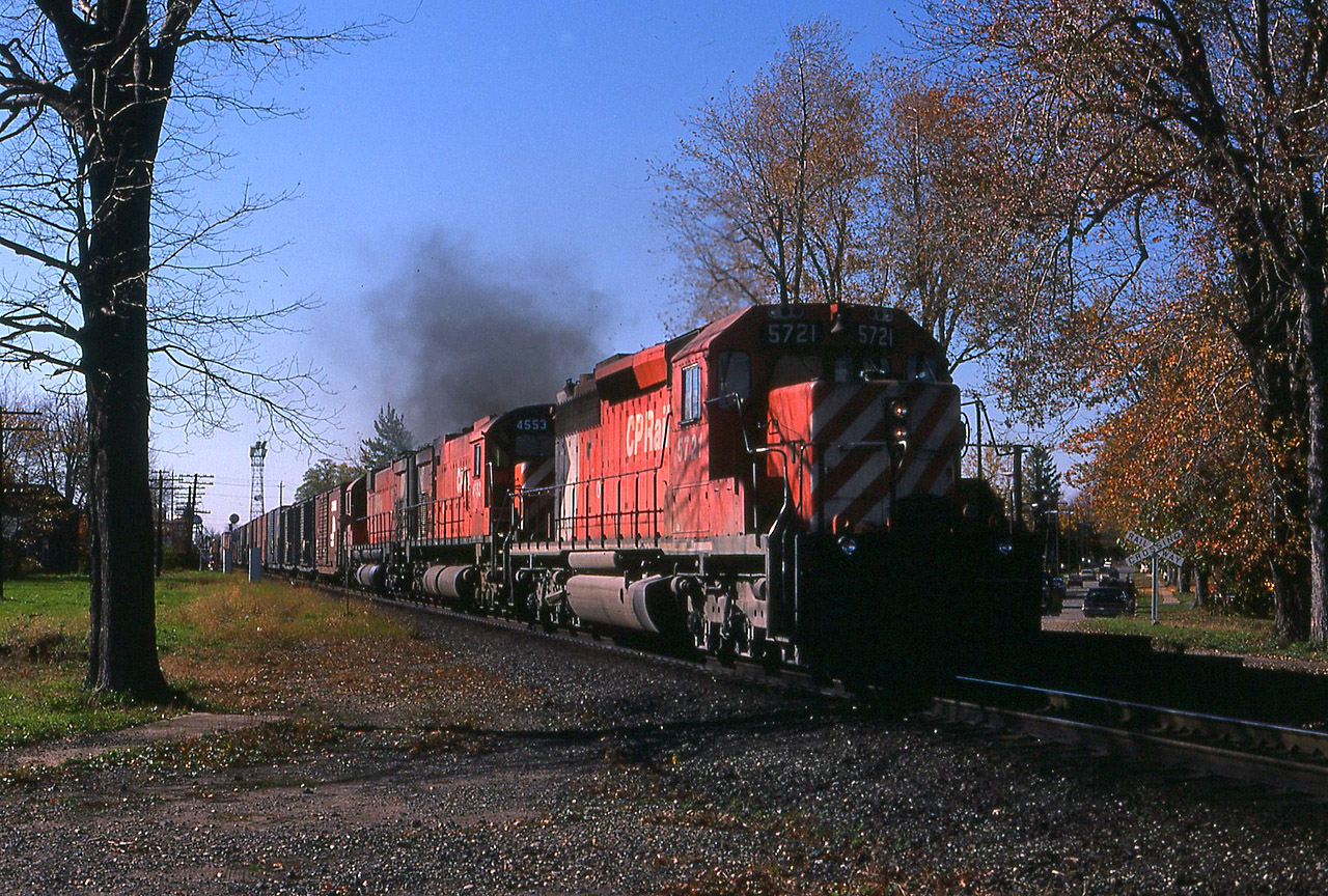 Train 904 about to hit the C&O diamond in Chatham on Oct 26/85, with 5721-4553-4551.