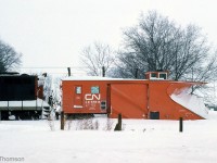 CN snowplow 55614 heads out north from Palmerston ON, clearing the line in February 1977. Plow 55614 was unique being the only "V" plow built by Jordan. It was later transferred to the Maritimes and painted black.<br><br><i>Note: Geotagged location not exact.</i>