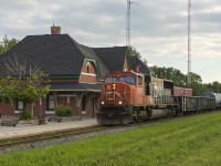 The VIA station these days is about the only bright spot in an otherwise sad looking rail scene on the former Canadian National mainline. Here we find CN 5722 as it leads a short train of only ten cars, slowly trundling along almost following on the heels of VIA train 78 that departed only 20 minutes earlier. 
