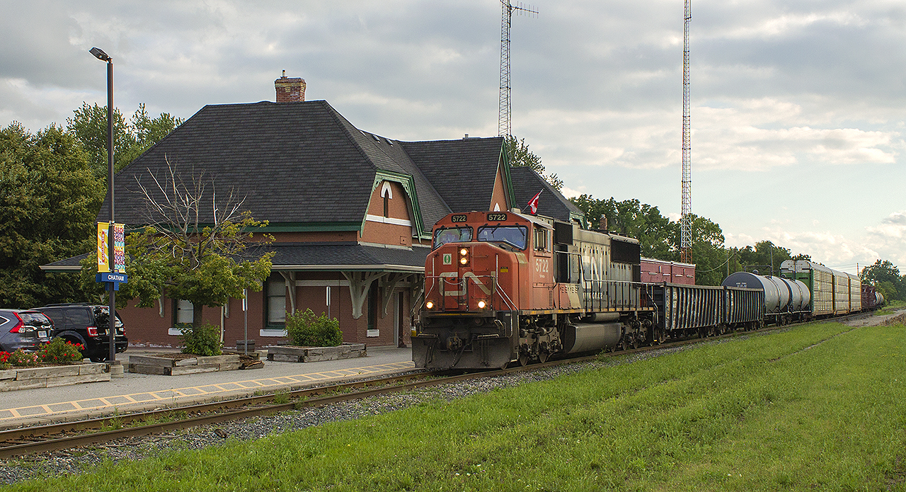 The VIA station these days is about the only bright spot in an otherwise sad looking rail scene on the former Canadian National mainline. Here we find CN 5722 as it leads a short train of only ten cars, slowly trundling along almost following on the heels of VIA train 78 that departed only 20 minutes earlier.