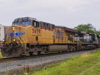 <b> ONE  SWEET MOMENT! </b> After receiving a tip from <a href="http://railpictures.ca/author/LukeBellefleur"> fellow rp.ca cotributor Luke Bellefleur </a> about this train coming through Chatham this morning, I normally wouldn't go out of my way to photograph it. When Luke told me that there was not one, but TWO Norfolk Southern engines helping to provide the power...No clouds could take away the excitement of seeing this lashup today! Because you never see that everyday!!! Bonus unit was UP 5479 in the lead of CP train 141. 