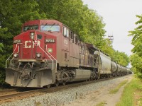 <b> STRANDED? </b> I don;t think so. After missing the head power of the oil train, for once I went with my gut feeling and waited this train out to see what was bringing up the rear. Behold, my first ever shot of a CP freight with a 9754 as the pusher unit on the rear. It ain't much to look at, but made for a good day nonetheless.