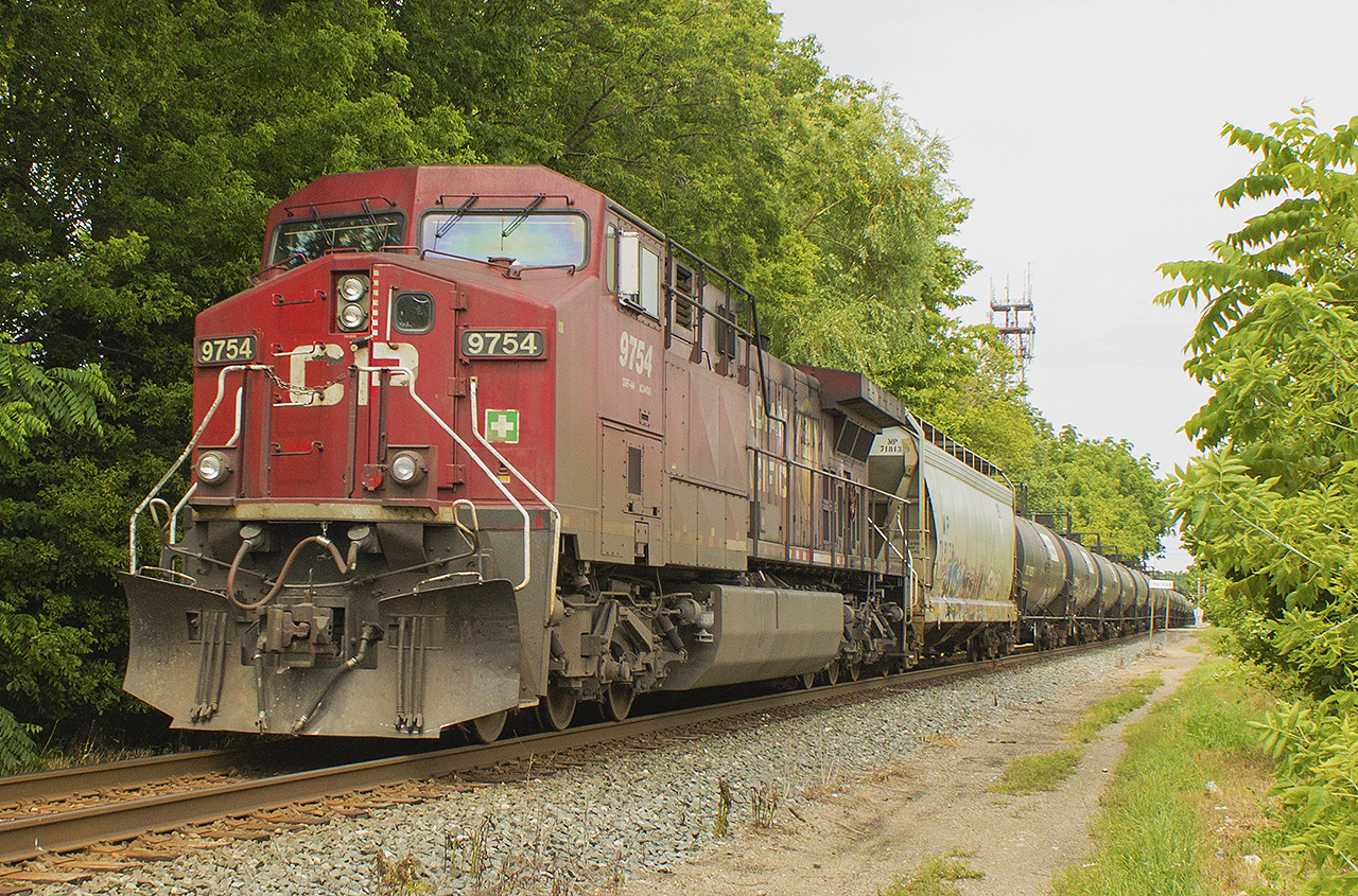 STRANDED?  I don;t think so. After missing the head power of the oil train, for once I went with my gut feeling and waited this train out to see what was bringing up the rear. Behold, my first ever shot of a CP freight with a 9754 as the pusher unit on the rear. It ain't much to look at, but made for a good day nonetheless.