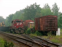 A tie train sits tied down in Parry Sound, beside whatever used to be left of the old yard. Most signs of the small yard have now been ripped up/disappeared into the ground, and the 40 foot boxes and flats engineering used to use for storage have long been replaced with a new building instead. Progress strikes again. 