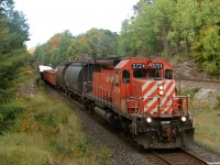 CP 434 - CP 5724 South coasts through Rosseau Road beside CN's Bala sub on the approach to Brignall, where they'll clear into siding for a Northbound before heading home to MacTier. 