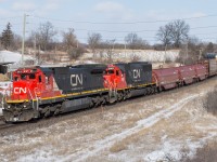 Back before CN abolished Sarnia to Port Robinson trains 330 and 331 we used to be treated to a mid day Westbound freight on the Dundas Sub daily.  331 was a freight that often ended up with interesting power and was an easy one to chase due to it working Paris Ontario to lift SOR traffic.  On February 11, 2016 I found myself standing at Copetown Ontario waiting on 331 with CN 2010 and CN 5462, a pair of standard cabs...not too shabby.  As soon as the head end passed me I highballed for Garden Avenue, beating them there by 5 minutes for a second shot.