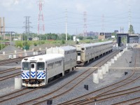 A single AMT 'Go-Kart' (ex-GO Transit single level car built by Hawker Siddeley) and all nine gallery cars that Canadian Vickers built for CP in 1969 as the first bilevel cars in Canada (currently AMT 900-901 & AMT 920-926) are stored at the fairly new Pointe-Saint-Charles Maintenance Centre. All of these cars have been out of use since AMT acquired new Bombardier multilevel cars in 2010.