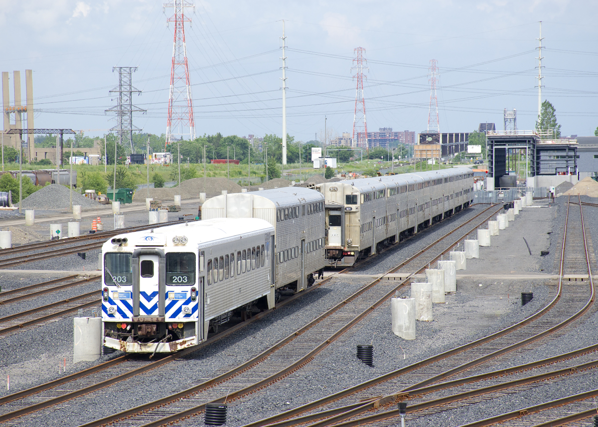 A single AMT 'Go-Kart' (ex-GO Transit single level car built by Hawker Siddeley) and all nine gallery cars that Canadian Vickers built for CP in 1969 as the first bilevel cars in Canada (currently AMT 900-901 & AMT 920-926) are stored at the fairly new Pointe-Saint-Charles Maintenance Centre. All of these cars have been out of use since AMT acquired new Bombardier multilevel cars in 2010.