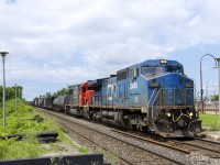 CN 368 has Illinois Central units in two paint schemes (IC 2456 & IC 1031) as it heads through Dorval just as the sun appeared.