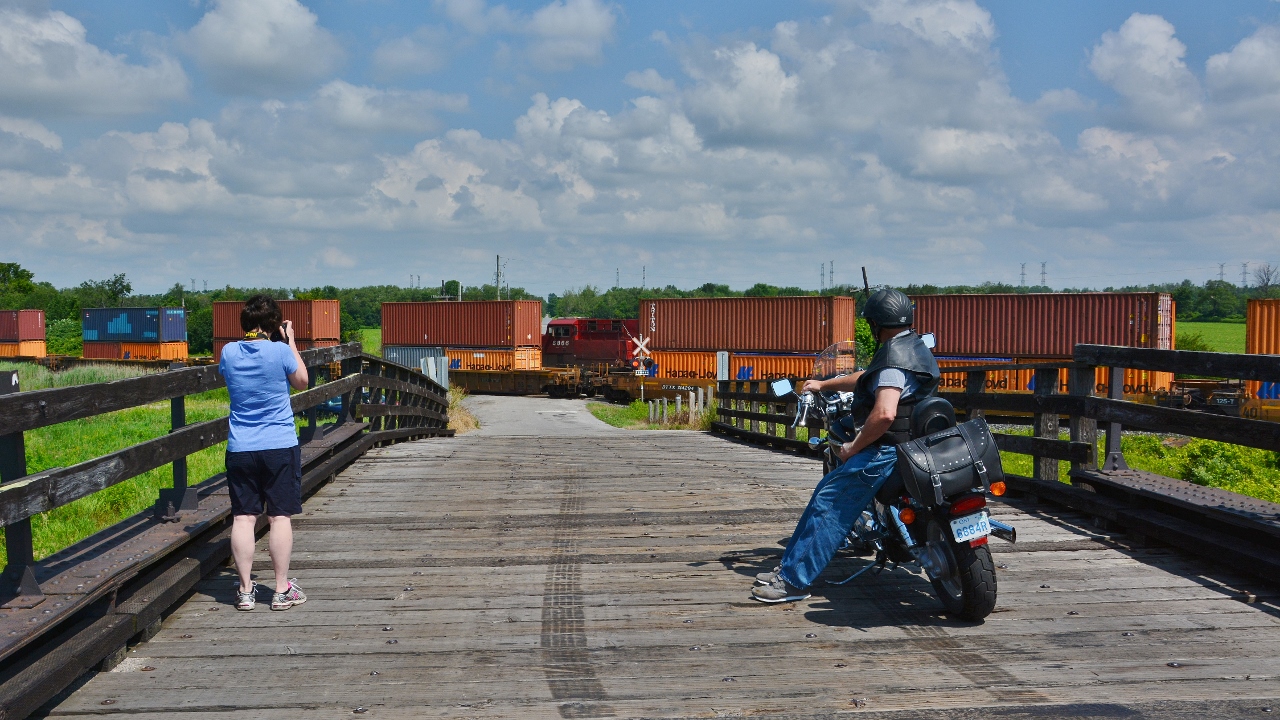 The Meet

 
 CP #8523 east (with CP8807, COFC),  #142 is creeping eastward in the siding,


 CP #8877 west ( COFC) rolls westward on the main


 CP Belleville Subdivision mile 156.0; Lovekin, Ontario


  Digital by S.Danko at 10:20 July 18, 2017


More CP Lovekin 


   circa 2014 


   circa 2012 


   circa 1984 


sdfourty