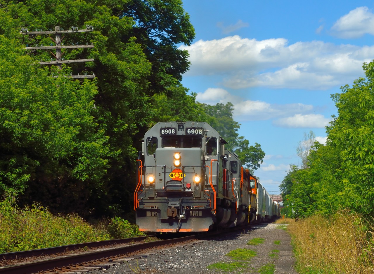 GEXR 431 is seen at mile 49.33 along the Guelph headed for Stratford with an ex-Alstom SD40-3 leading the way.  6908 was built as CN 5198.  Today it sill retains the Canadian style snowshields behind the cab.
