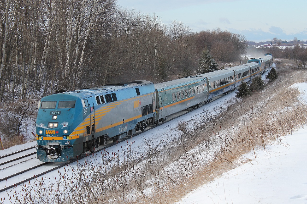 An E/B VIA Rail J train screams passed the end of Nichols Road in Newtonville, ON.