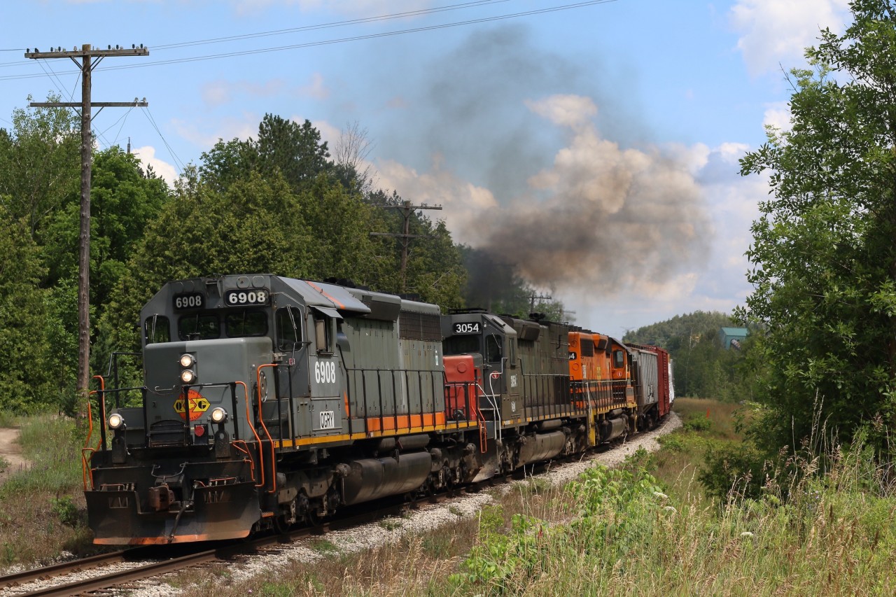 The climb up the Niagara Escarpment for the Goderich Exeter may not be as scenic as others but what it lacks in scenery it makes up for in sound. This location better know as Dolly Varden to locals has become a favourite spot of mine over the years and the GEXR usually puts on a good show here. This day the old "Tunnel Motors" was showing its age as it digs into the grade but it is still going strong. It's hard to know what the future holds for the GEXR here, with increased GO Tranits traffic on the horizon these trains may once again be pushed to running in the dark or relocated all together possibly running to London instead of Toronto. But for now the almost daily show continues, and it's one of the last spots in Ontario where solid sets of standard cab six axle EMDs still roam regularly.