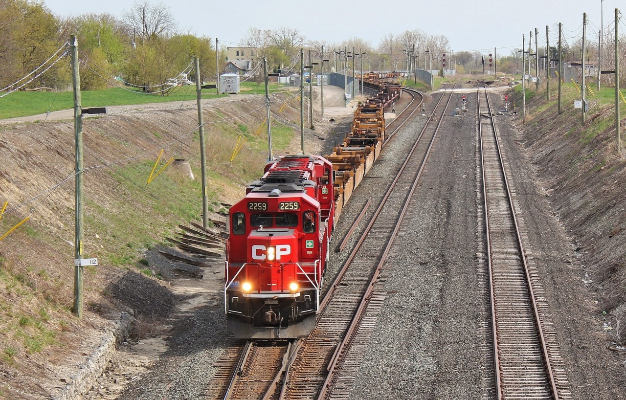 T-25 snakes its way down the CP CASO connector (now all part of the Windsor Sub) to enter the tunnel to Detroit. In tow they have intermodal traffic dropped in Walkerville yard by 143 earlier that day. Now that 142/143 don't run through Windsor (again), T-25 no longer runs as well. The intermodal traffic destined for Detroit that 143/142 ran now comes down on 235/234 and 235 just runs directly to the Detroit instead of T-25 taking the traffic across.